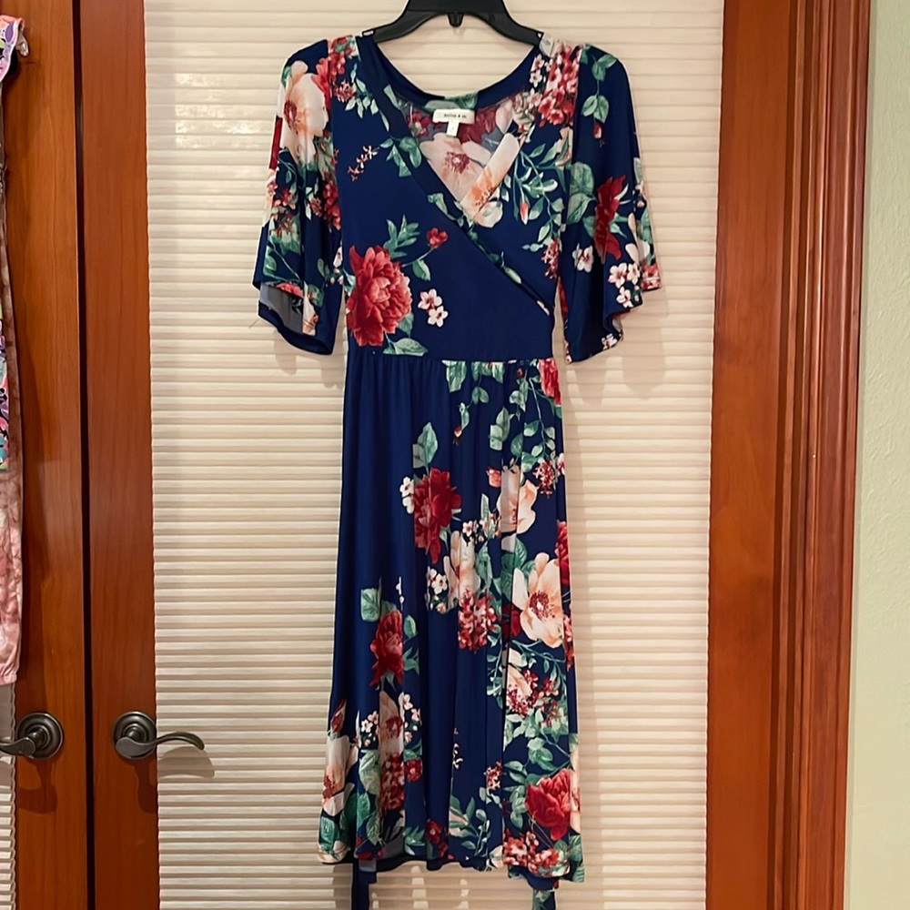 Women’s or teen dress size, medium blue with red and pink floral print